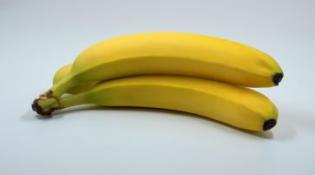 3 bananas on a white background